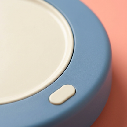 Dusty Blue & Cream USB Cup Warmer — A Rounded Desk-Coaster Concept for Prepared Drinks, Reading Breaks & Thoughtful Workspaces
