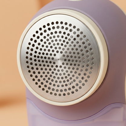 Dusty Lilac & Cream Electric Fabric Shaver — A Rounded Clothing-Care Concept for Seasonal Wardrobe Sorting & Everyday Knitwear Routines